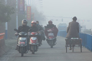 Beijing upgrades haze alert from yellow to orange