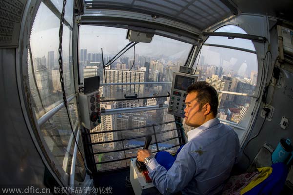 Hard-working hands behind high-rise skyscraper