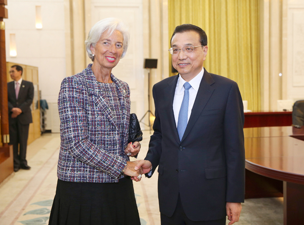 China able to maintain balance while reducing risk, premier tells IMF chief