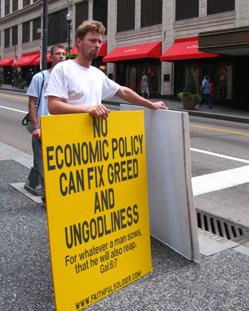 Protestor in downtown Pittsburgh