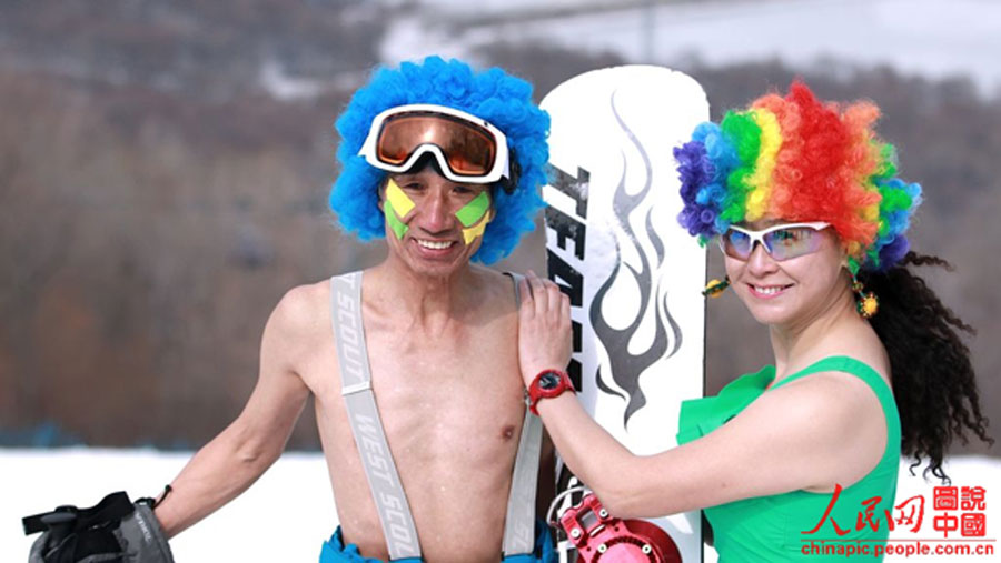 Skiers in swimsuit bid farewell to ski season