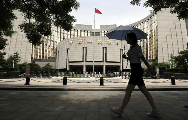 Chinese stocks edge down after bank reserve requirement cut