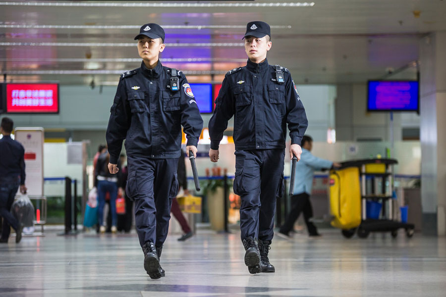 Behind an airport: Obscure people carrying out their duties