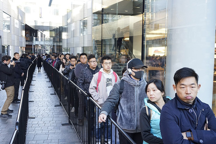 Apple fans around the world line up for iPhone X