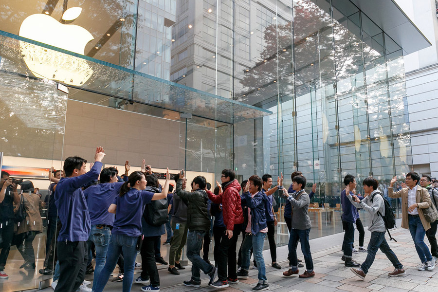 Apple fans around the world line up for iPhone X