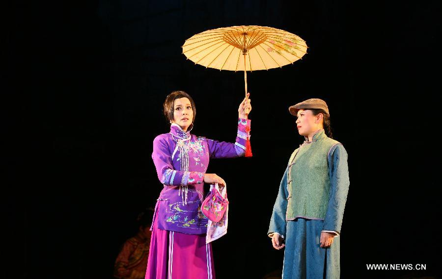 Actress Liu Xiaoqing performs stage drama