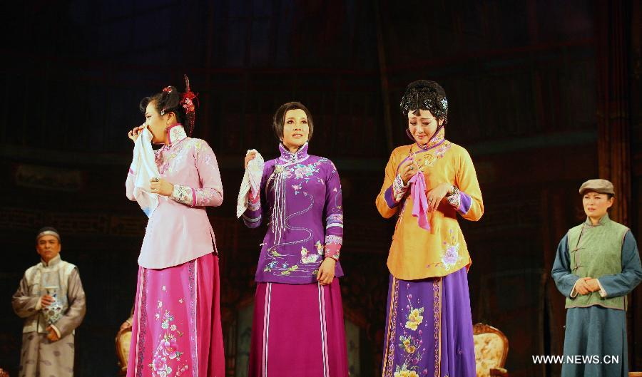 Actress Liu Xiaoqing performs stage drama