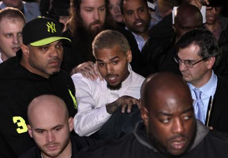 Singer Chris Brown pleads not guilty to assault that broke man's nose