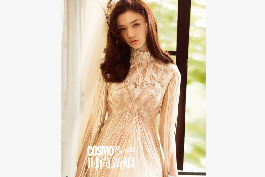 Actress Lin Yun poses for fashion magazine