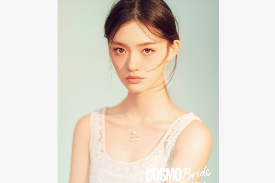 Actress Lin Yun poses for fashion magazine