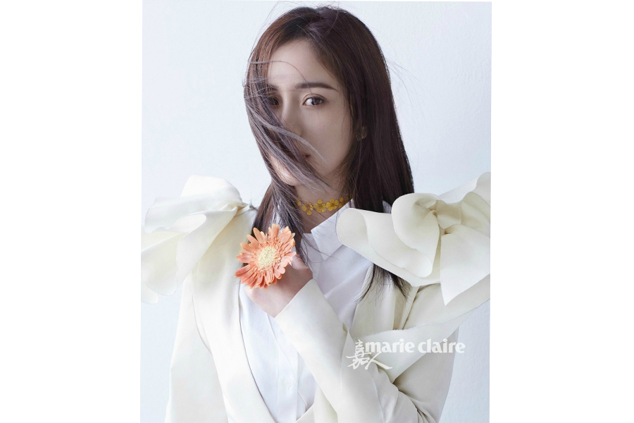 Actress Yang Mi poses for fashion magazine