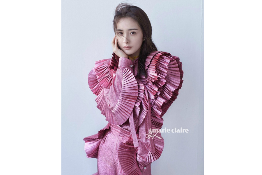 Actress Yang Mi poses for fashion magazine