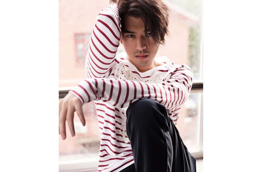 Actor Chen Bolin poses for fashion magazine