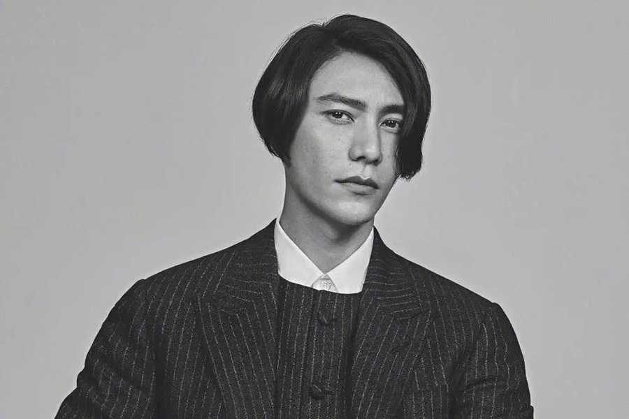 Actor Chen Kun poses for fashion magazine