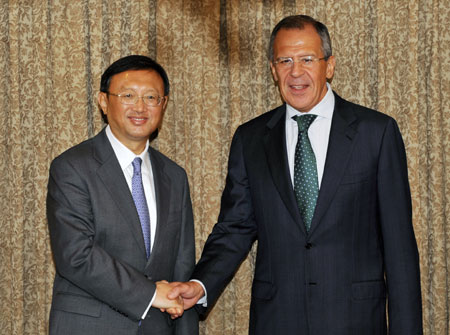 Chinese FM meets with Russian, Indian counterparts