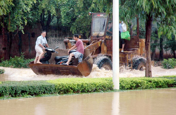 Typhoon-triggered floods kill at least 4