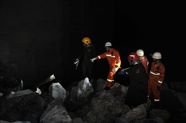 4 dead, 3 remain buried in SW China landslide