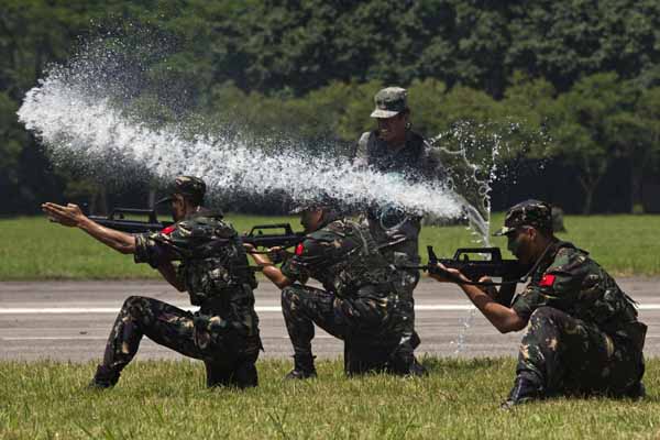 HK arrests two forcing into PLA's barracks