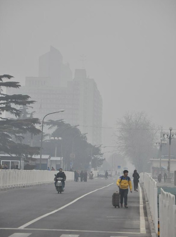 Beijing upgrades haze alert from yellow to orange