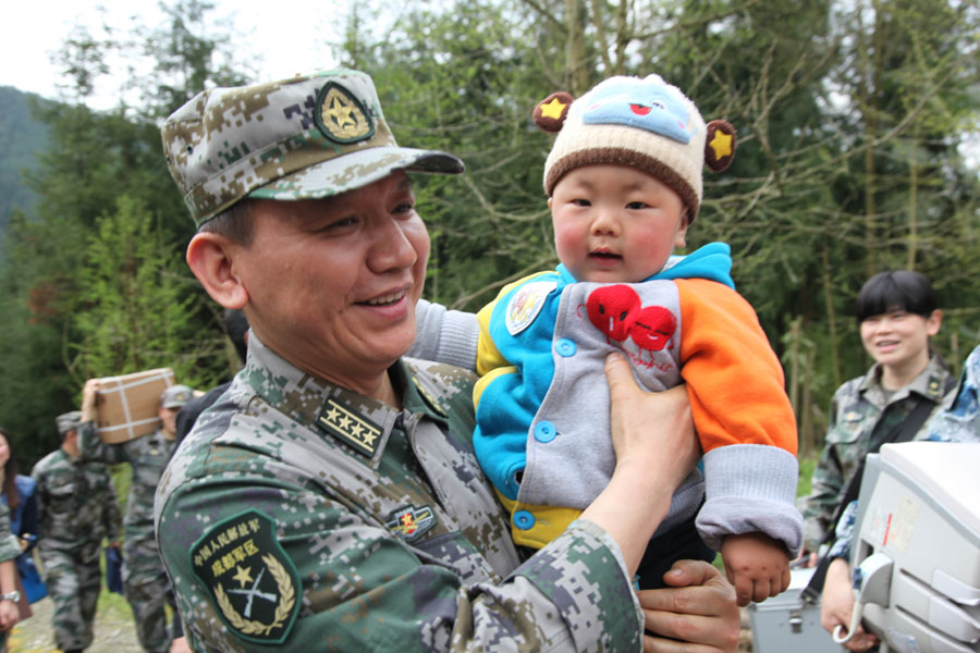 Rescuers celebrate first birthday of 'quake babies'