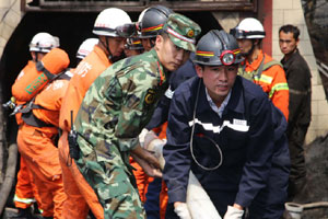 9 rescued, 16 still trapped in flooded China mine