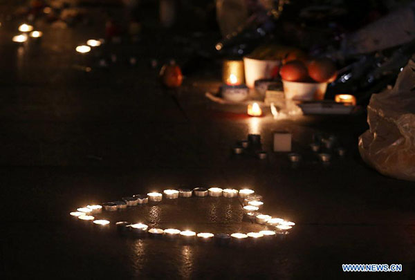 People mourn victims in Shanghai stampede