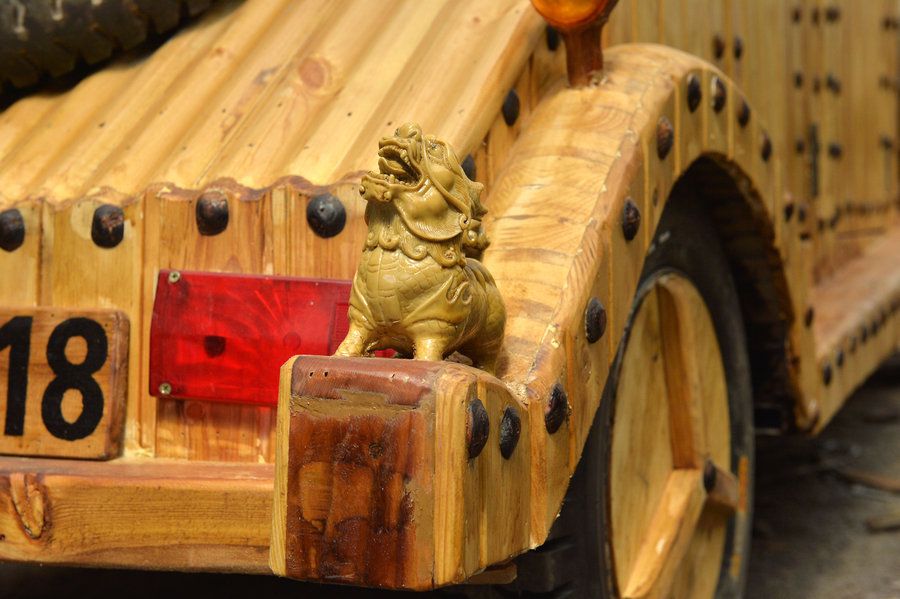 Chinese man makes antique car out of wood