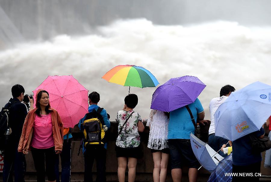 Tourists amazed by artificial water cascades in Henan