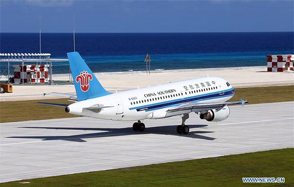 China conducts successful test flights at newly-built airfield in South China Sea