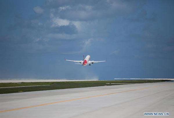 China conducts successful test flights at newly-built airfield in South China Sea