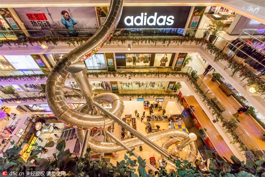 Spiral tube slide opens in Shanghai shopping mall