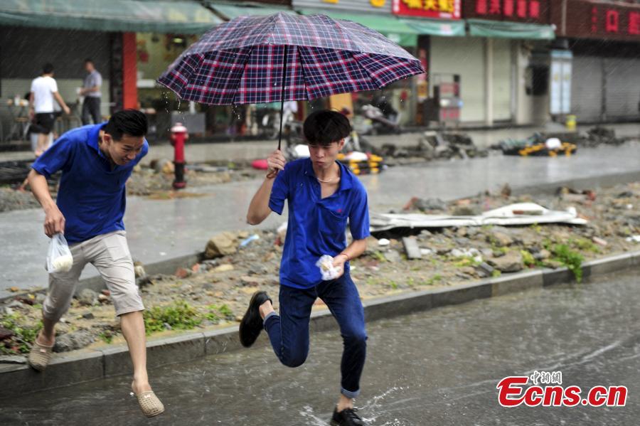 Sports venue turns makeshift shelters as Typhoon Nida lashes Shenzhen