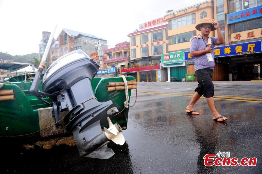 Sports venue turns makeshift shelters as Typhoon Nida lashes Shenzhen