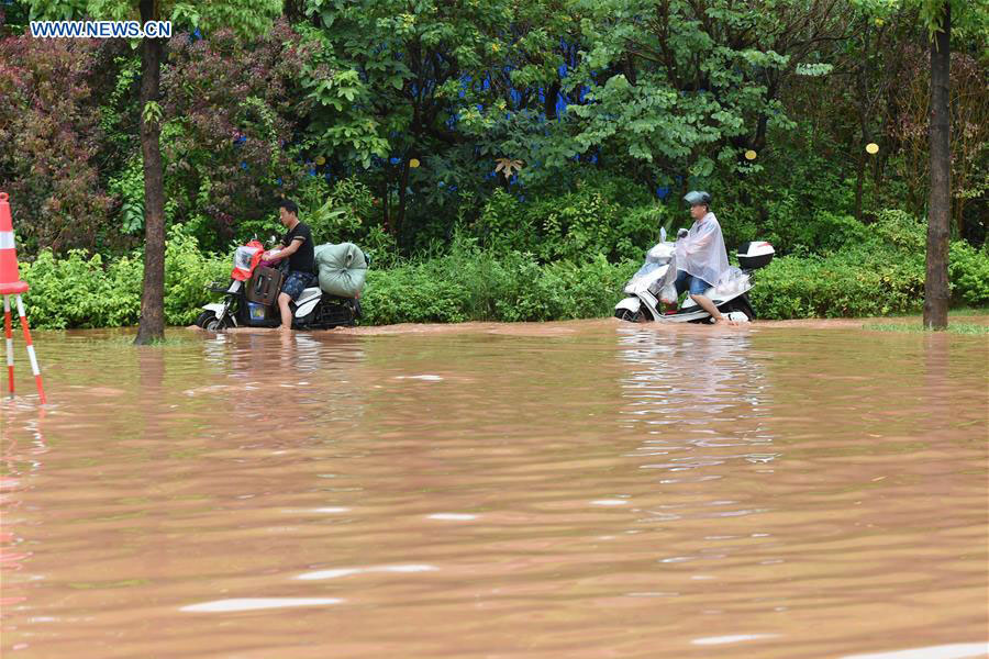 After Typhoon Nida, torrential rain hits South and Central China