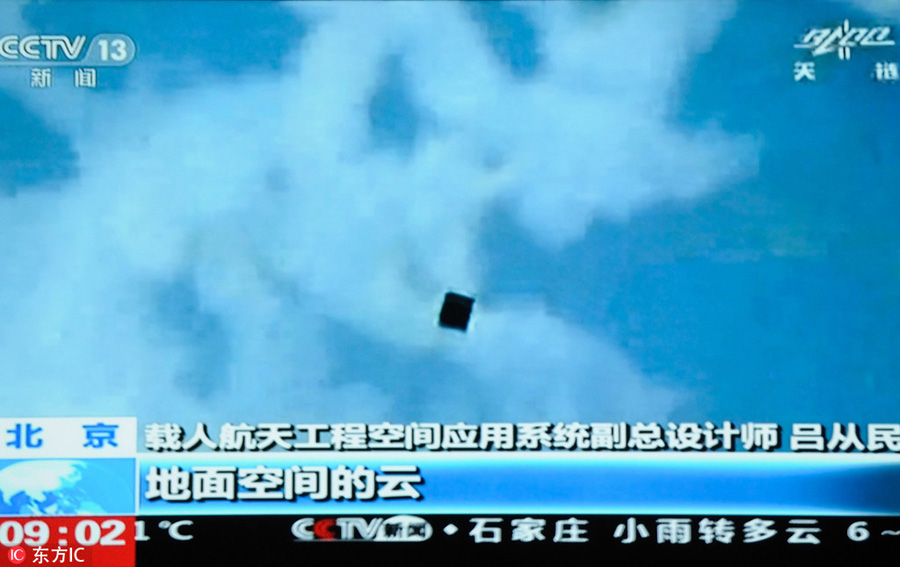 Accompanying satellite sends back images of Tiangong II, Shenzhou XI