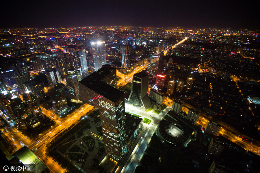 Workers behind Beijing's tallest building