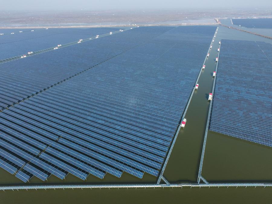 Solar power project under construction above fishery water