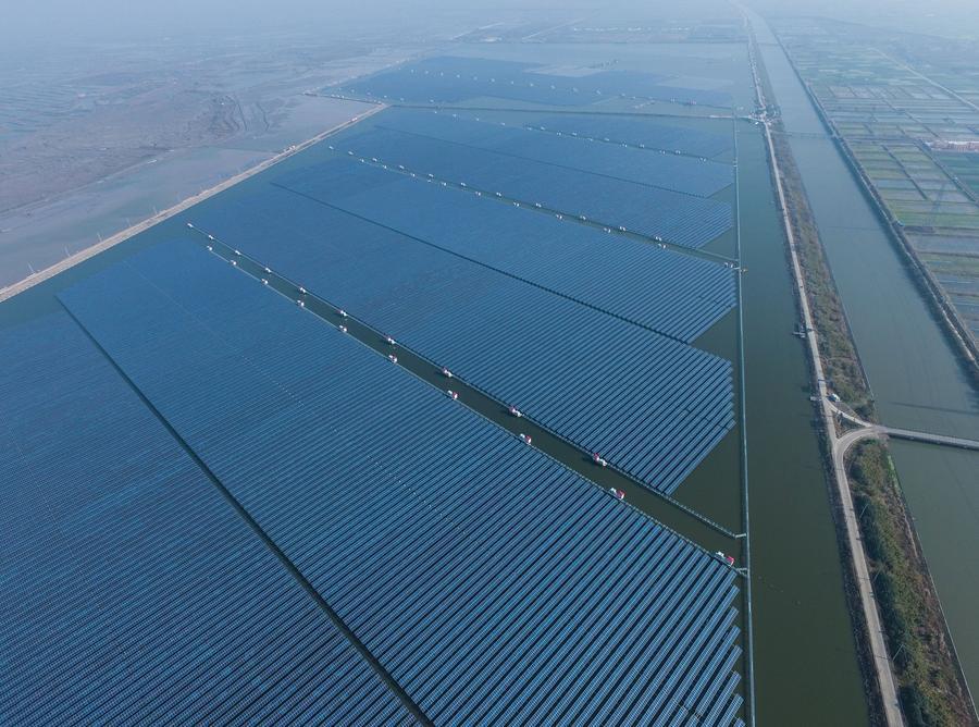 Solar power project under construction above fishery water