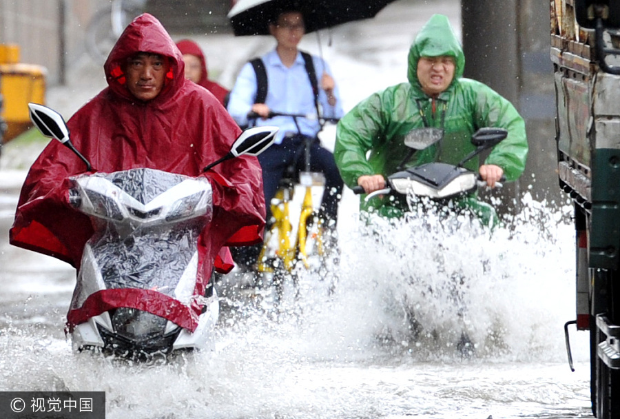 Torrential rain leaves six dead, three missing in China