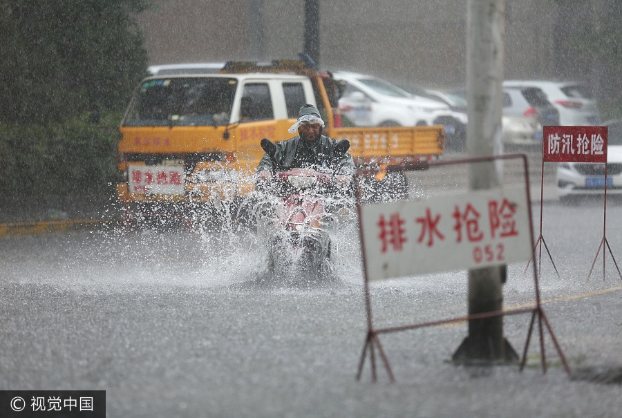 Torrential rain leaves six dead, three missing in China