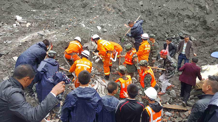 Xi urges all-out rescue effort after landslide buries 62 homes