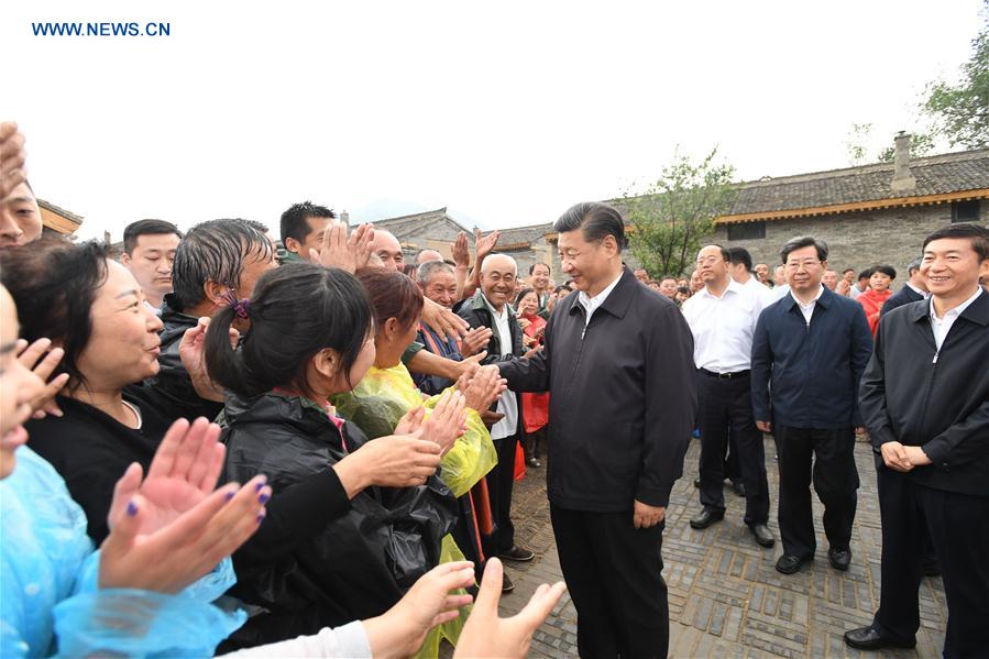 Xi's Shanxi tour steps up war on poverty