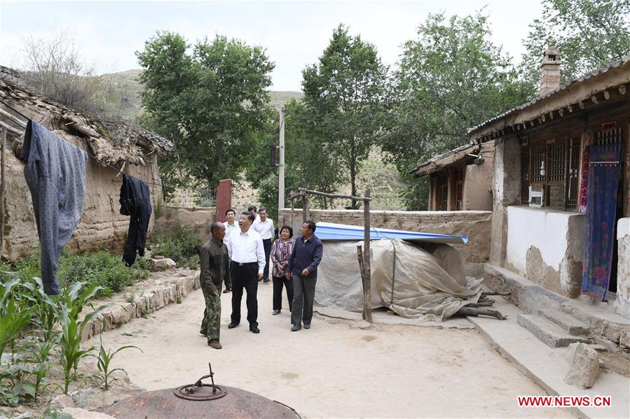 Xi's Shanxi tour steps up war on poverty