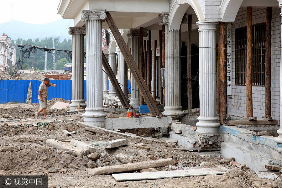 Four-story building moved 10 meters for railway line