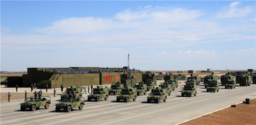 Xi inspects troops as China's military might on show