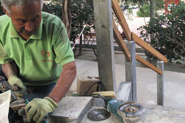 76-year-old man constructs stone path by himself