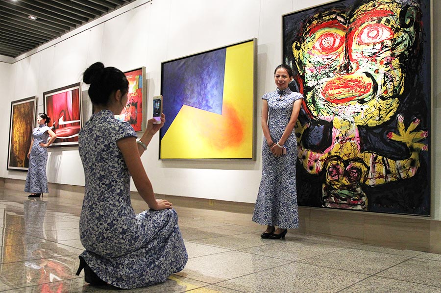 Over 200 paintings from around the globe at Beijing exhibition