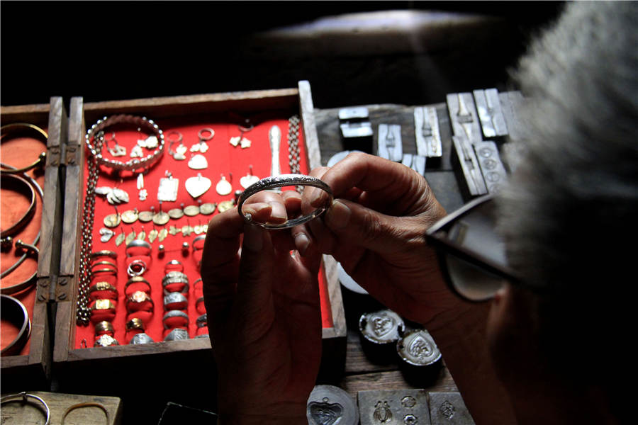 Craftsman sticks to handmade silver craft