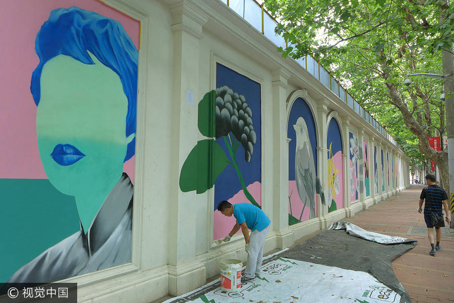 Murals turn construction site into art corridor