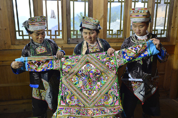 Jiang Laoben and her exquisite craftsmanship of Miao's 'hundred-bird dress'